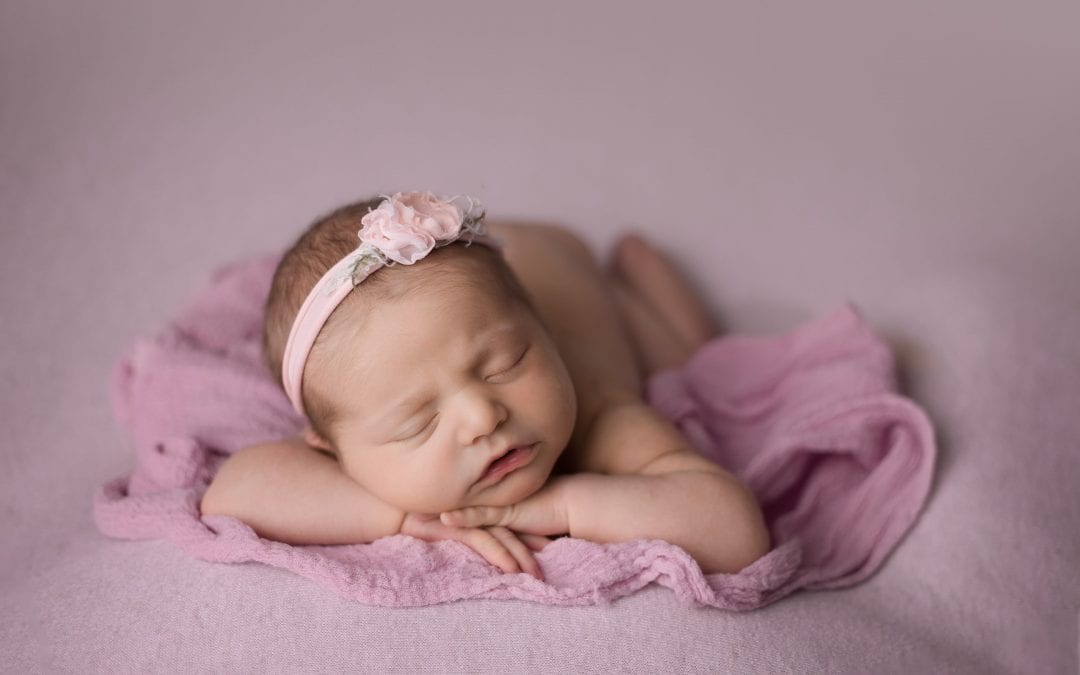 When should I book my newborn photography session?