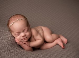 This light blue fabric is another boy favorite.  This was a piece of fabric that I found at a local fabric warehouse while I was there shopping for fabric for a quilt I was making.  I just happened to find this amazing light blue knit fabric and realized it was a great option for newborn photography props.
