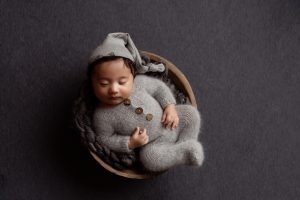 most popular newborn poses wearing outfits