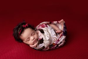 most popular newborn poses with personal items