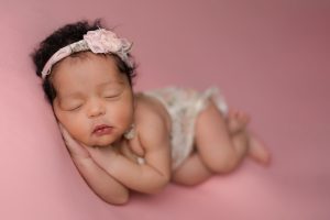most popular newborn poses wearing outfits