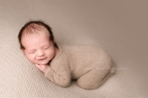 most popular newborn poses wearing outfits