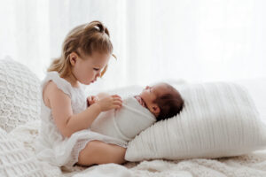 how to prepare siblings for a new baby